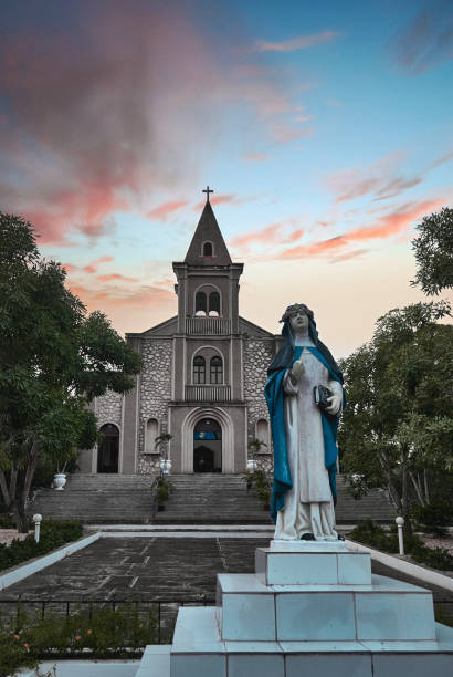 Santa Rosa de Lima church temple in a beautiful sunset with a reddish sky and long exposures