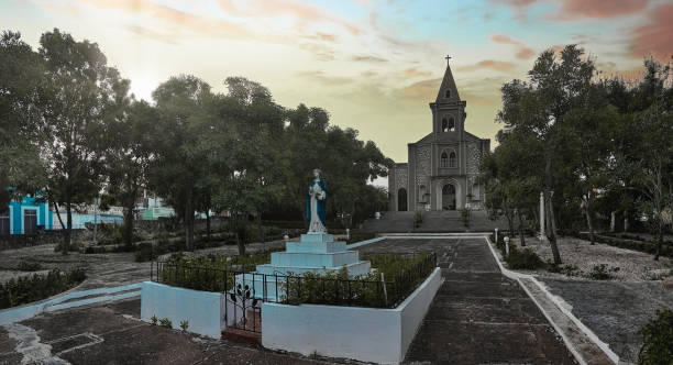 Santa Rosa de Lima church temple in a beautiful sunset with a reddish sky and long exposures