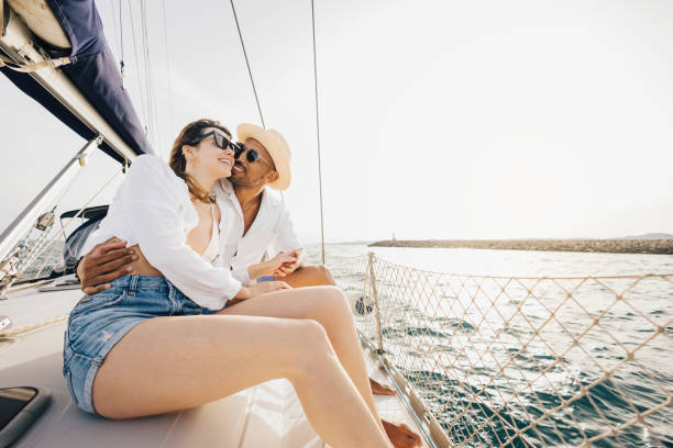 istock Happy couple enjoying a romantic sailing adventure on a sunny day 2179710121