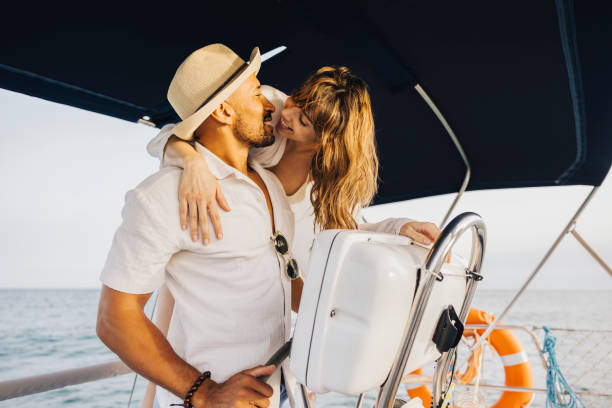istock Romantic couple enjoying a sailing adventure on a yacht 2179710334
