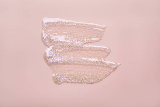 istock Shimmering pink glitter makeup swatch on pale background 2179714465