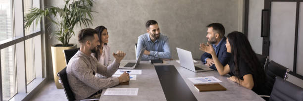 istock Diverse team of project managers enjoying teamwork, partnership 2179718630