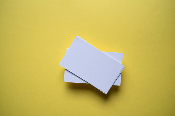 istock White card on a yellow background 2179721293