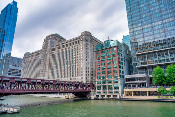 Low Angle view of yellow and black Bridge Sign from the Chicago River in downtown Chicago, IL