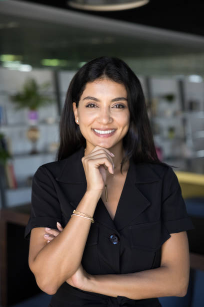 istock Happy beautiful young Middle Eastern businesswoman looking at camera 2179723632