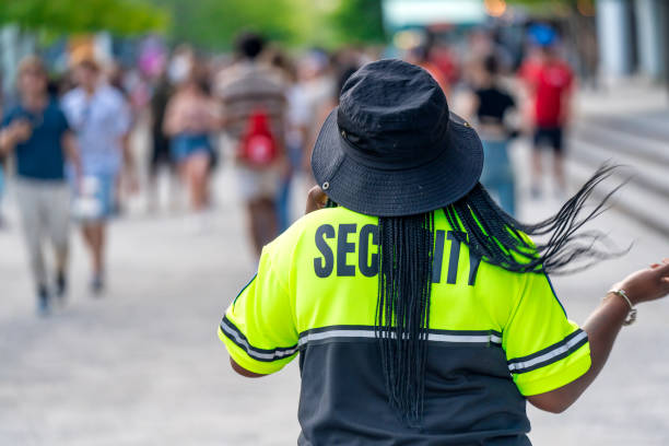 istock Security officer controlling crowd of people 2179728425