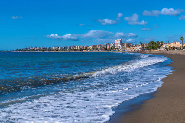 istock Torre del Mar beach Spain Andalusia with white waves on shore 2179728500