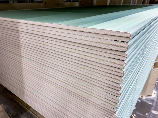 istock Green Board Drywall Panels are essential for construction and renovation, offering excellent moisture resistance and superior insulation for diverse applications 2179739335