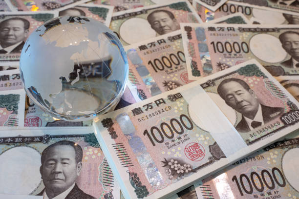 istock Glass globe and many 10,000 yen bills (new design) 2179739494