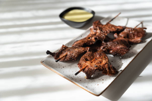 istock Grilled beef heart anticuchos, a Peruvian specialty. 2179740459