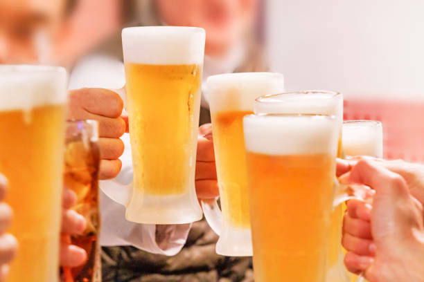 istock People toasting with ice-cold beer and sour drinks 2179740838