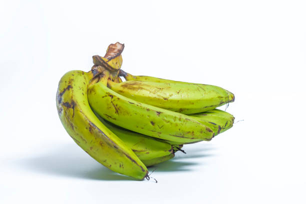 A fresh ripe banana isolated on a white background, showcasing its natural yellow color and smooth texture. This tropical fruit is a nutritious and delicious choice, perfect for food photography.