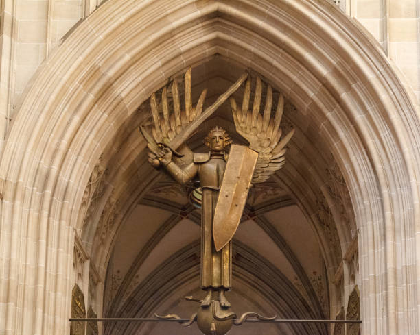 An Angel with a sword and shield statue in Ulm cathedral, Germany