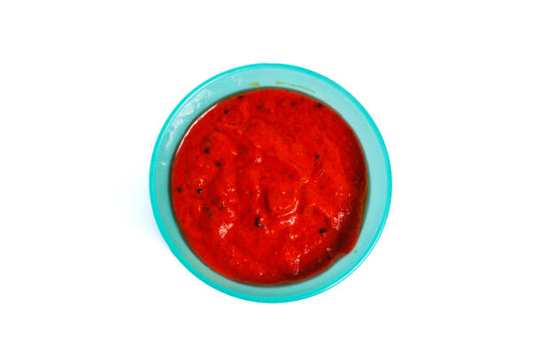 istock Spicy chili chutney in the bowl on a white background. 2179741895