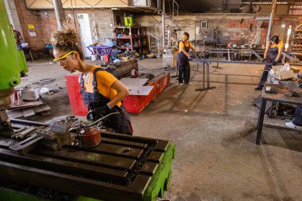 istock Women at Work in Metal Workshop 2179742283
