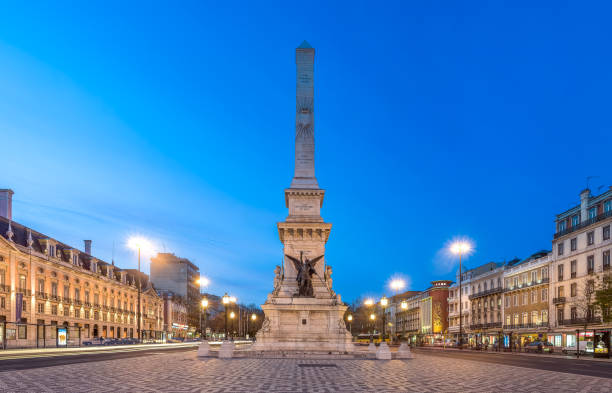 istock Nighttime Glow at Restauradores Square With Light Trails in Lisbon 2179743962