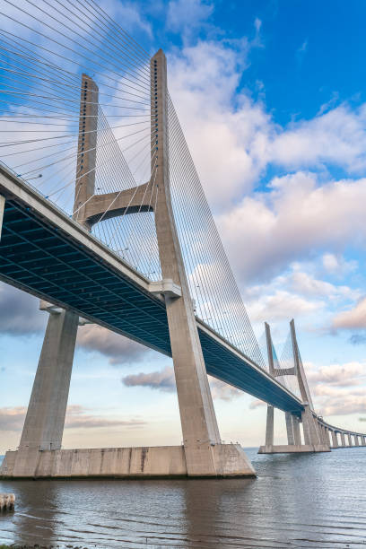 istock Vasco Da Gama Bridge Arches Over Lisbon's Tagus River 2179747477