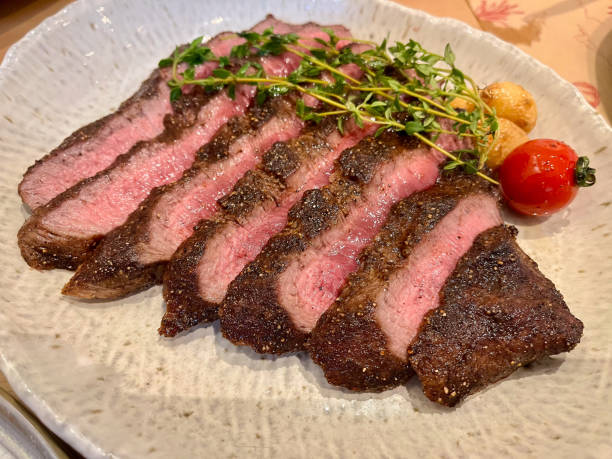 istock Close up of medium rare A5 steak on plate. 2179750883