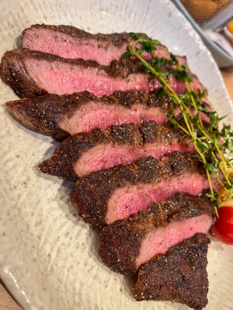 istock Close up of medium rare A5 steak on plate. 2179750917