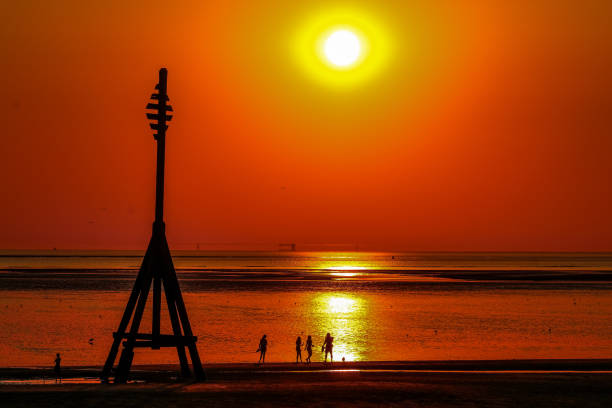 A beautiful sunset at the beach. This photo captures the last few moments of a beautiful summers day.