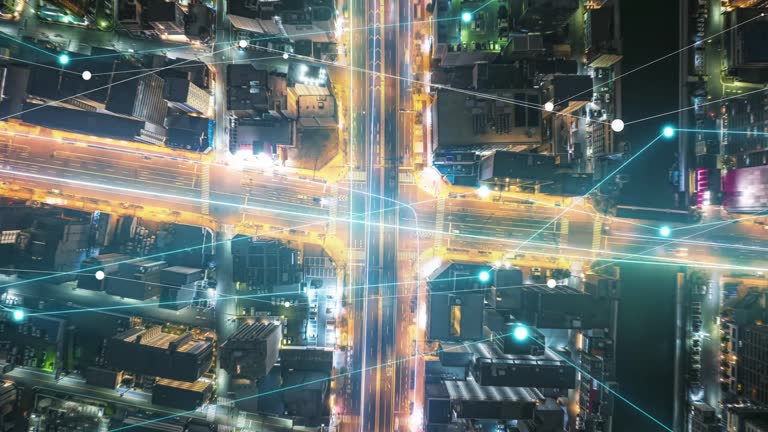 Street Intersection At Night With Modern Data Visualization Overlays Displaying