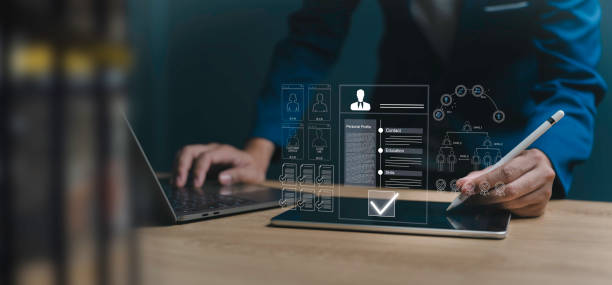 istock Employee selection, businessman process select the optimum resume application form, recruitment to interview and join with company. interviewing and hiring through an internet recruitment agency. 2179755847
