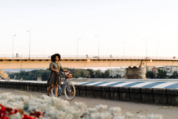 Woman cycling through the city
