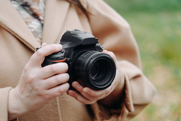 istock dslr camera in woman hands 2179757990