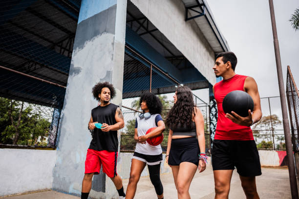 istock Basketball players talking and walking on the public park 2179763003