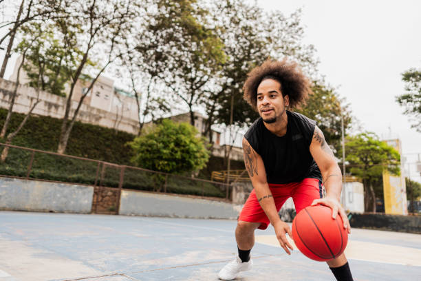 istock Basketball player playing on a sport court 2179763600