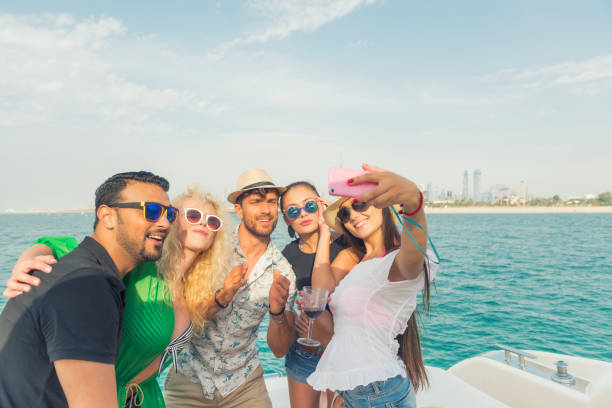 istock Friends together on a boat in Emirates 2179763808