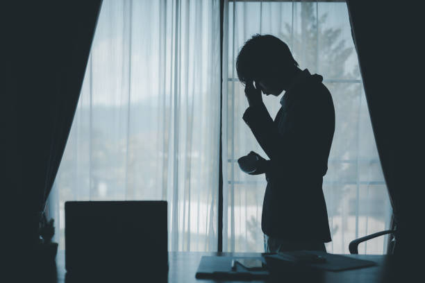 istock Stressed businessman, sleepy man working in his office, sat at his computer, feeling weight of his job and the demands of his business. person, work, business, stressed, sleepy, office, computer, job. 2179765106