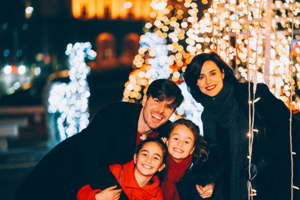 istock Family outside at Christmas night 2179770321