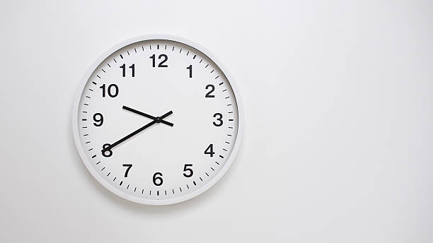 istock Clean White Clock at 09.40 or 21.40 on Minimalist White Background - Ideal for Time Concepts and Modern Design 2179770467
