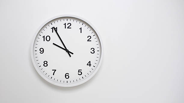istock Clean White Clock at 09.55 or 21.55 on Minimalist White Background - Ideal for Time Concepts and Modern Design 2179770475