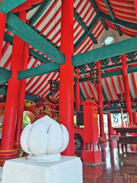 istock Red and green wooden pillars in Buddhist temple 2179774297