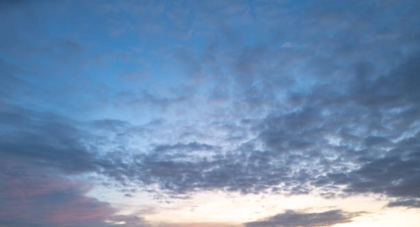 istock Clouds background. Dramatic Clouds Sunset Background. Sky with clouds in Sunrise. Sunrise with clouds in various shapes background. Calm Cloud. 2179776311