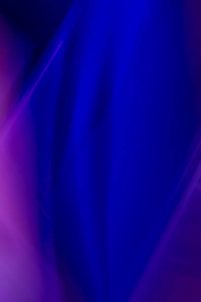 istock A striking abstract image with deep blue and purple hues, creating a vivid and flowing gradient effect. 2179777280