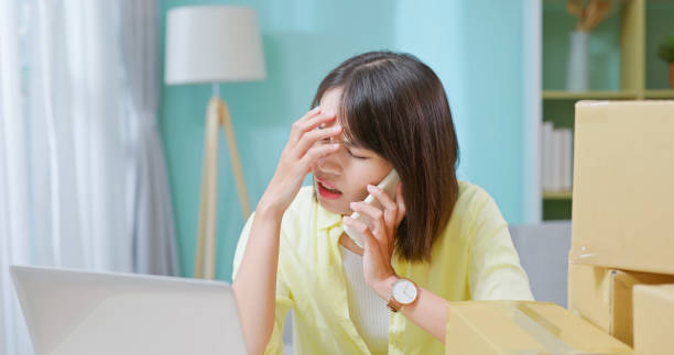 woman phone customer or supplier - 悩む ストックフォトと画像