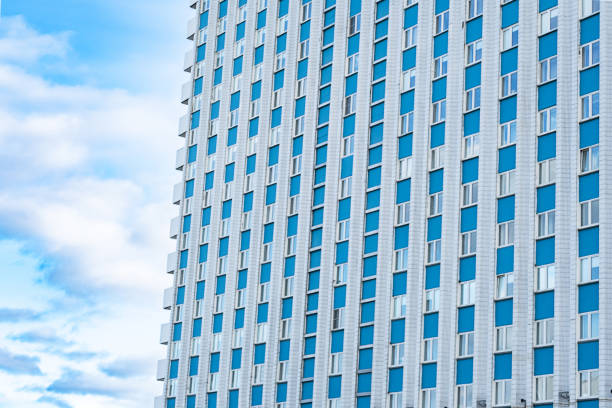 Modern Glass Facade with Sky Reflection. Abstract Architecture Background