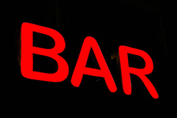 istock bright red neon sign advertising a bar 2179791052