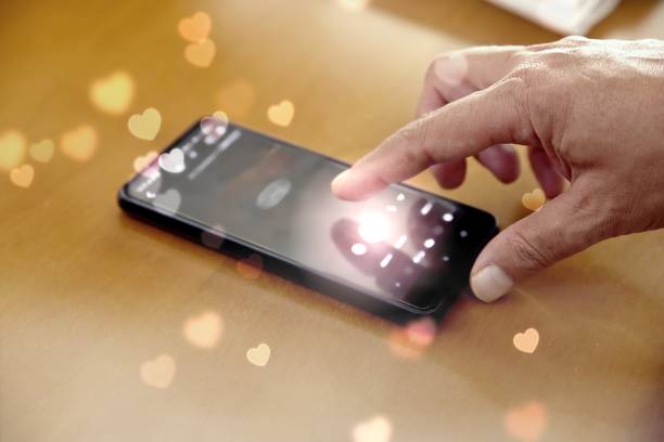 istock Someone presses the like button on a social media platform on their mobile phone 2179791371