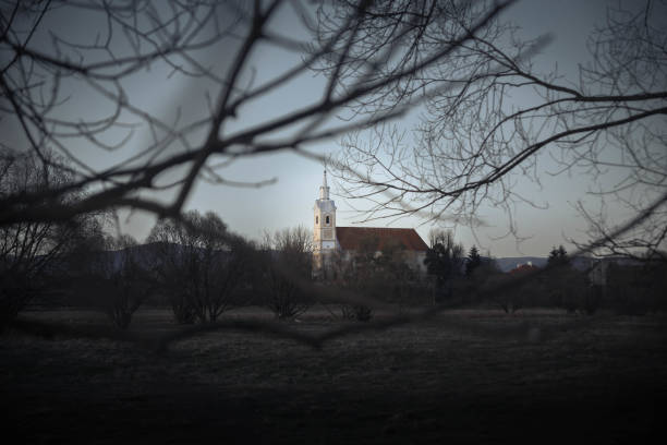 istock A church behind a field 2179791846