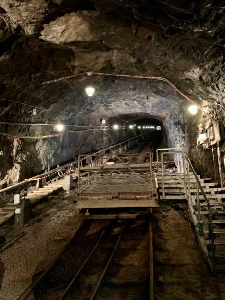 istock Underground Mine Tunnel: Industrial Interior with Tracks 2179792924