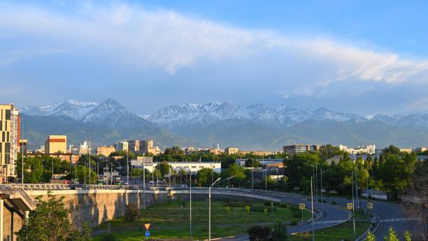 istock Almaty city skyline, Sunset light on buildings and mountains. 2179801176