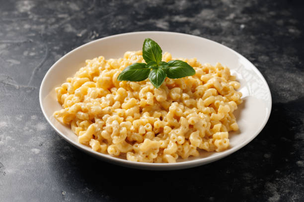 istock Creamy mac and cheese macaroni in a white bowl 2179805308
