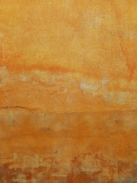 istock Peeling paint and rusty old metal background. Mustard colored rusty metallic abstract background. Patterns and texture. 2179807266
