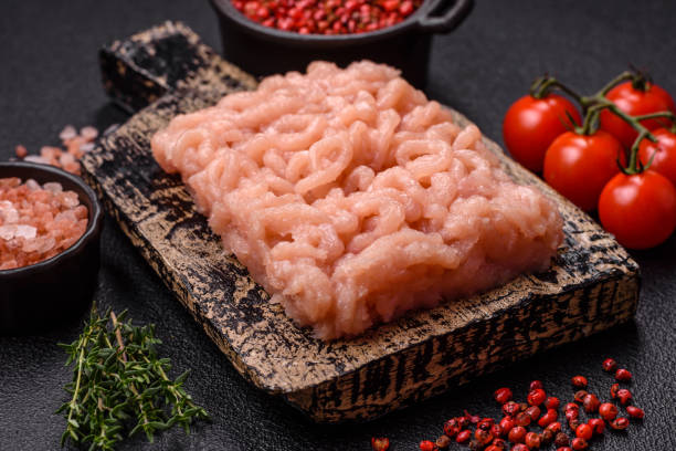 istock Fresh raw chicken mince with salt, spices and herbs 2179812017