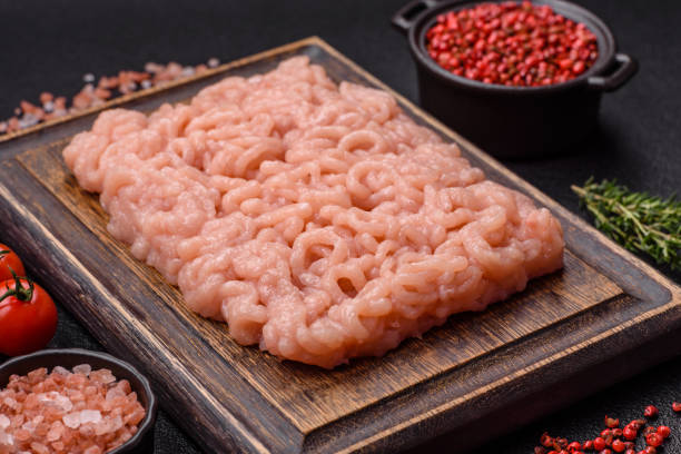 istock Fresh raw chicken mince with salt, spices and herbs 2179812145