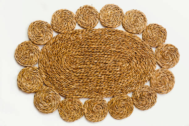 istock Closeup of a straw rug on a white background 2179815673